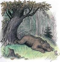 Дядя Миша медведь лежит на траве в лесу рядом мышь